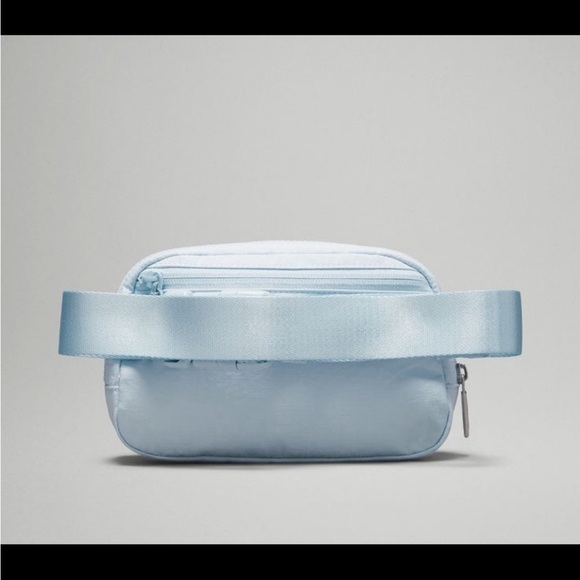 lululemon belt bag powder blue Everywhere Crossbody 1L Interior pockets hold the essentials LULULEMON ATHLETICA | Everywhere Belt